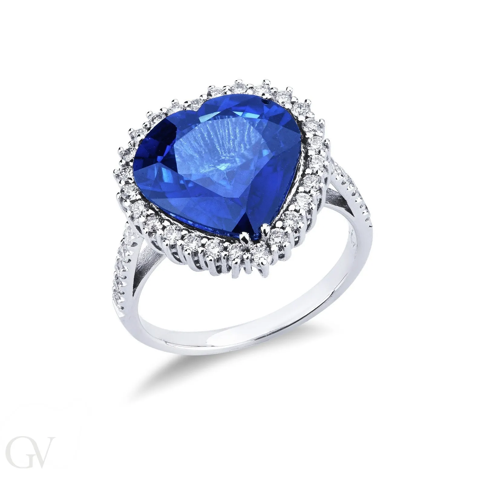 Anello a contorno in oro bianco 18k con zaffiro blu e diamanti