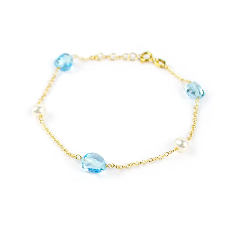 Bracciale in oro giallo con topazio azzurro e perle