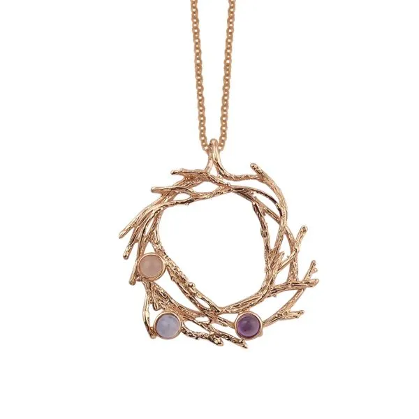Collana color oro rosa con pendente circolare intrecciato con cabochon colorati    