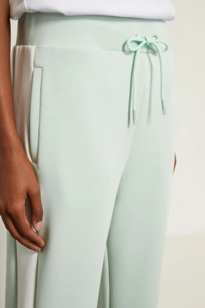 Joggers effetto seta lavata