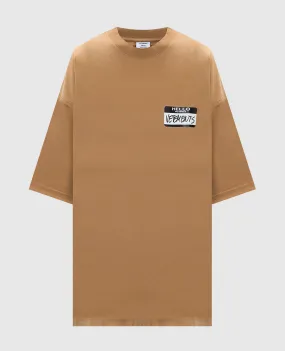 Vetements T-shirt beige con logo UA65TR110SW